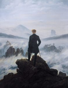 painting of a man standing on a rock, looking into the fog