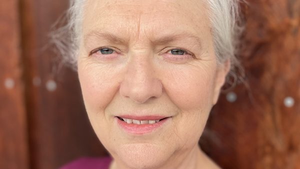 headshot photo of white-haired woman
